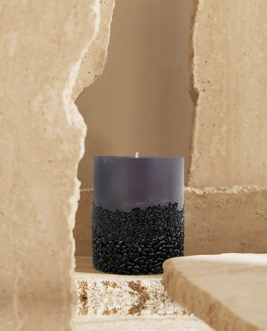 Home Decor Onyx Crystal Candle Displayed In a Travertine Background