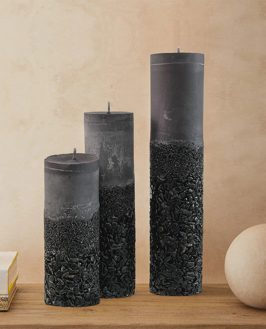 Three Black Onyx Crystal Candles Displayed on a Shelf Bringing Beauty to Home Decor